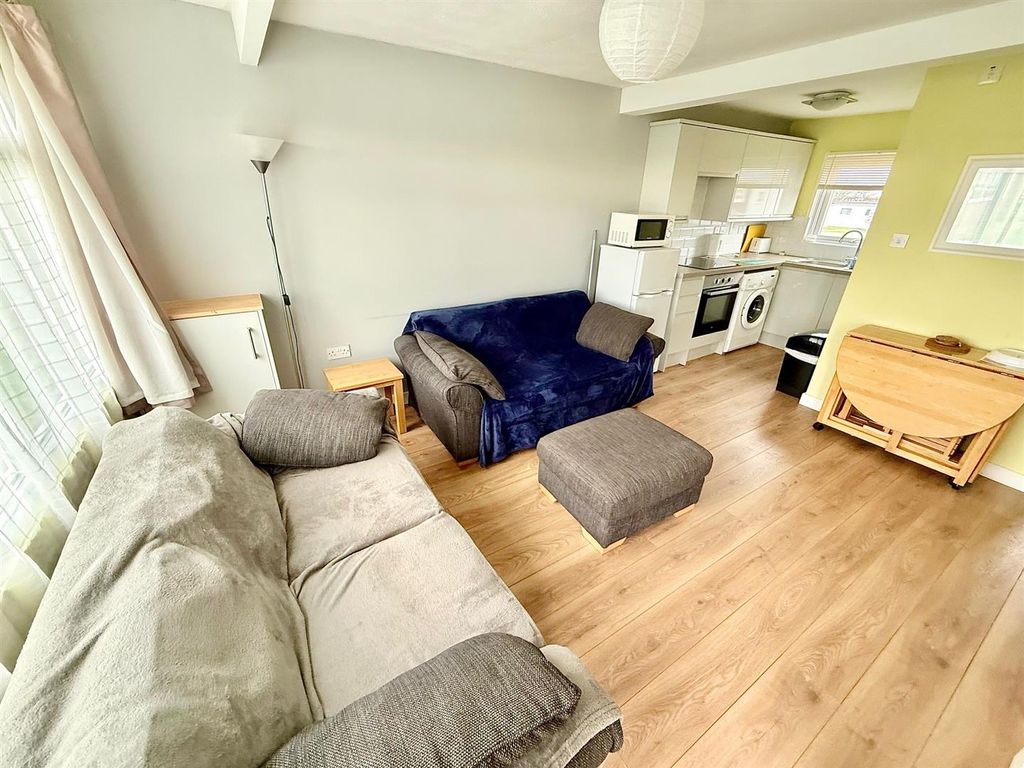 Property photo 2 of 9 Living Room And Kitchen