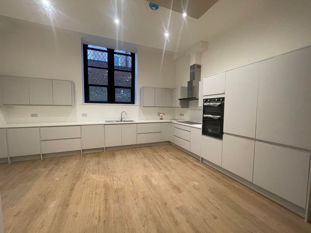 Property photo 2 of 9 Kitchen