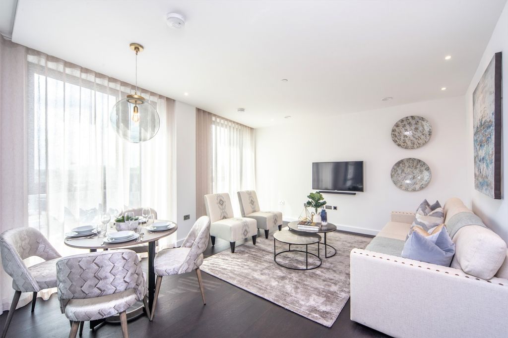 Property photo 2 of 11 A Stylish And Spacious Living Room Featuring Large...