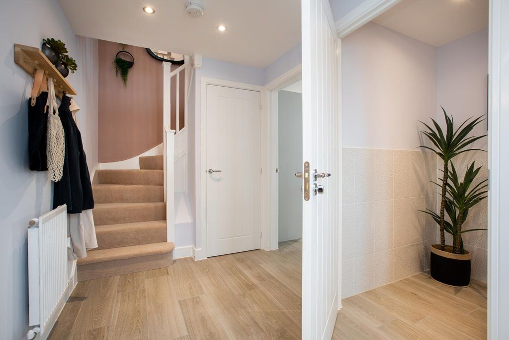 Property photo 2 of 12 A Generously Sized Hallway Welcomes You Home