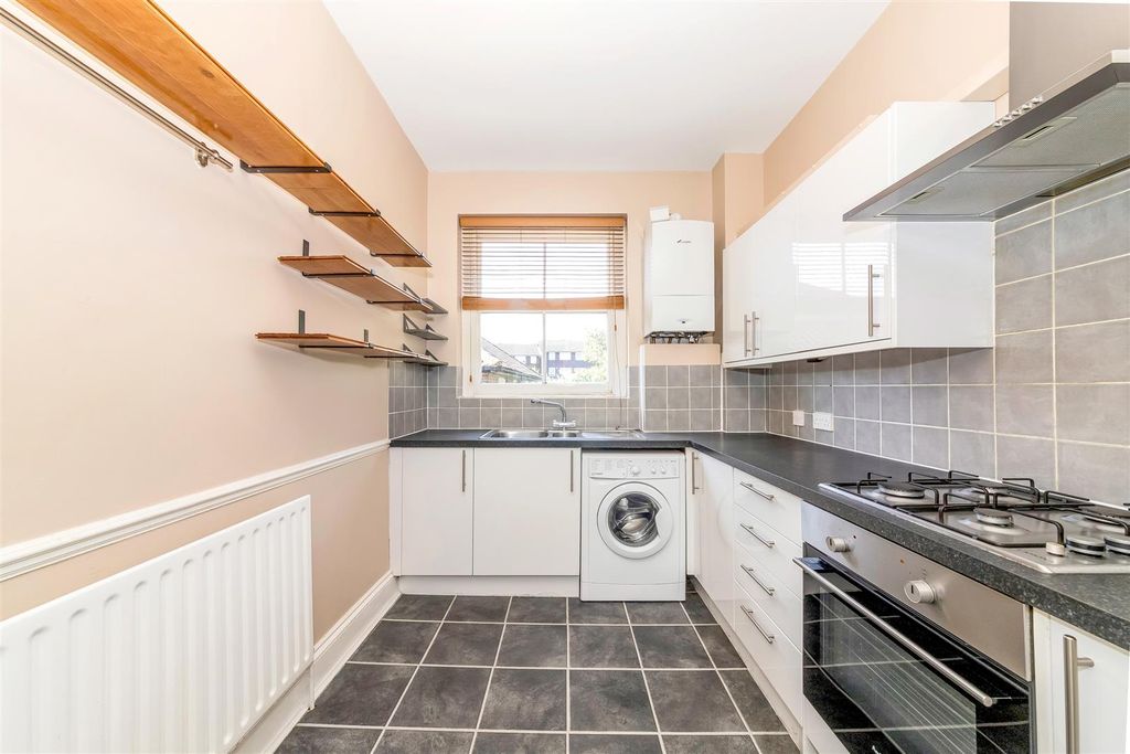 Property photo 3 of 16 Kitchen