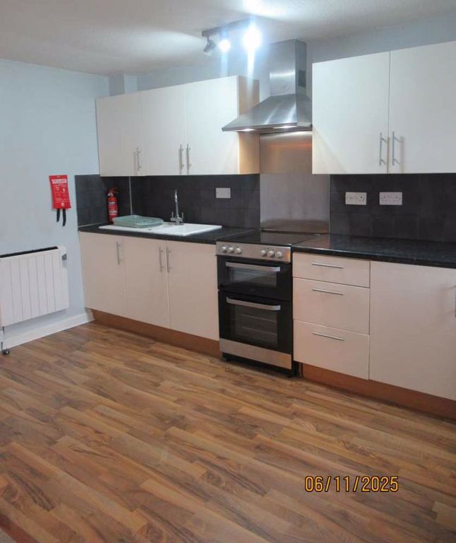 Property photo 3 of 12 Kitchen