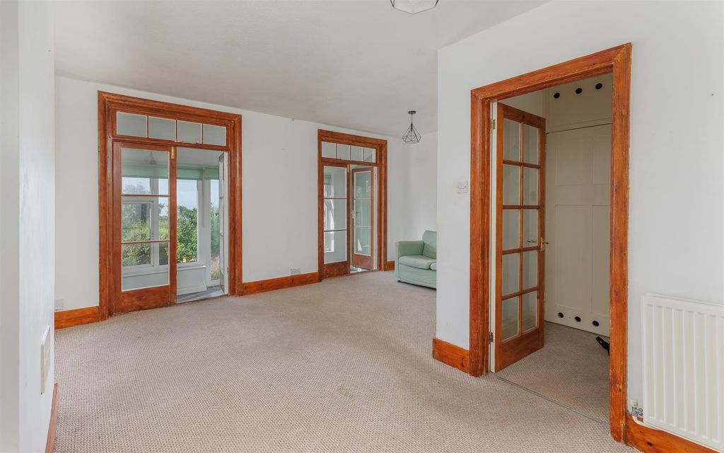 Property photo 2 of 32 Sitting Room Leading To Sun Room
