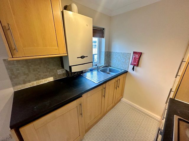 Property photo 1 of 7 Kitchen