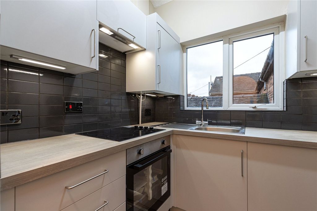 Property photo 2 of 9 Kitchen