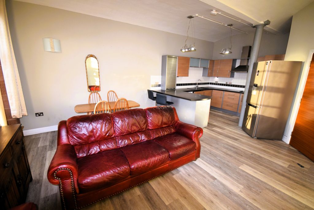 Property photo 3 of 12 Living Area