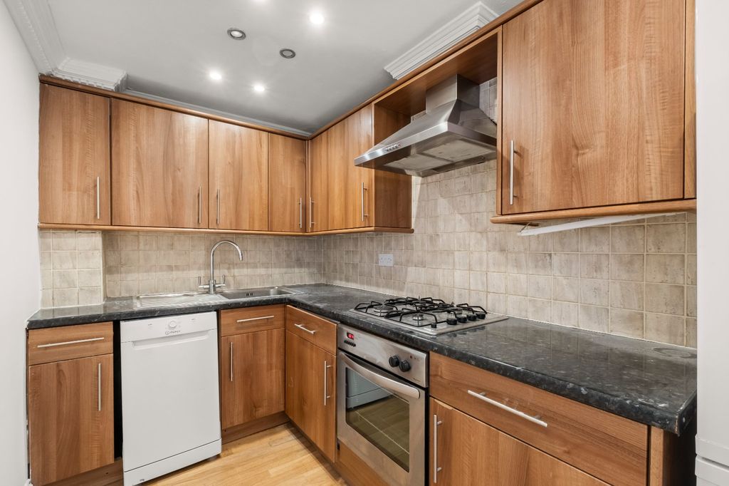 Property photo 2 of 9 Kitchen