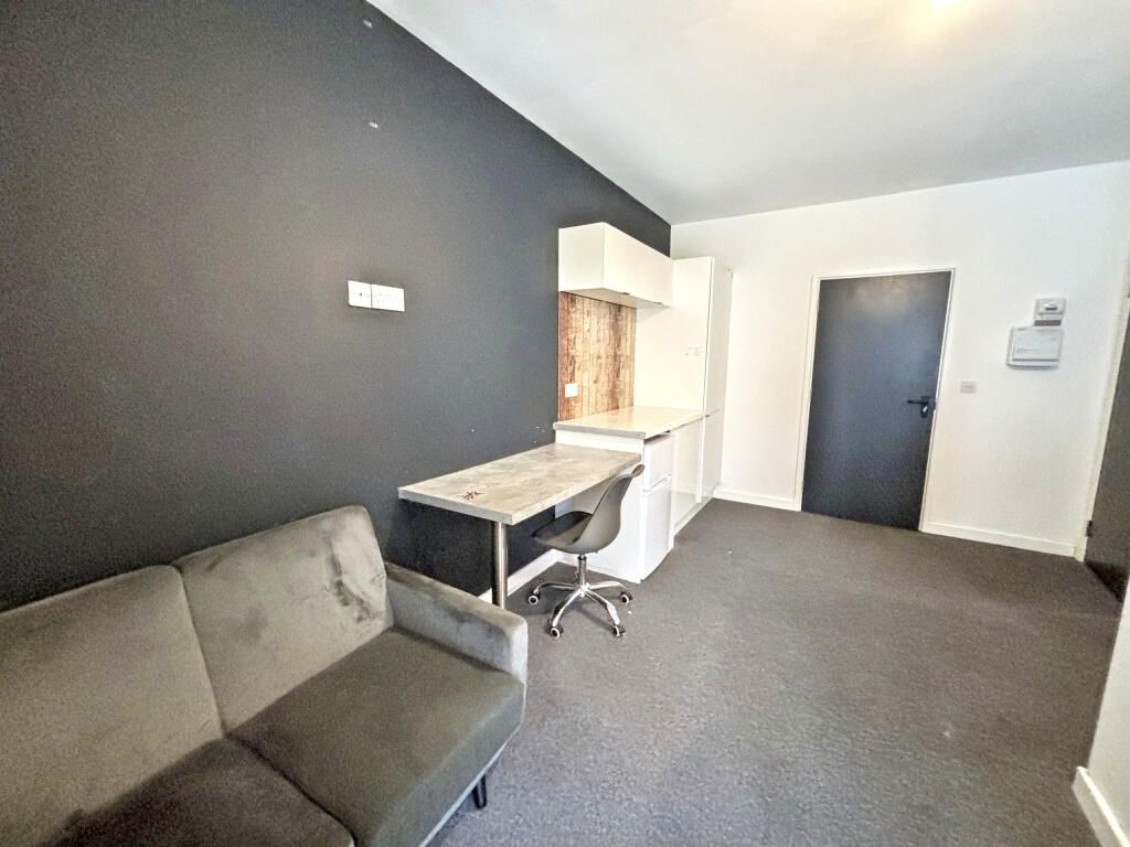 Property photo 2 of 5 A Bright And Airy Living Room With A Comfortable S...