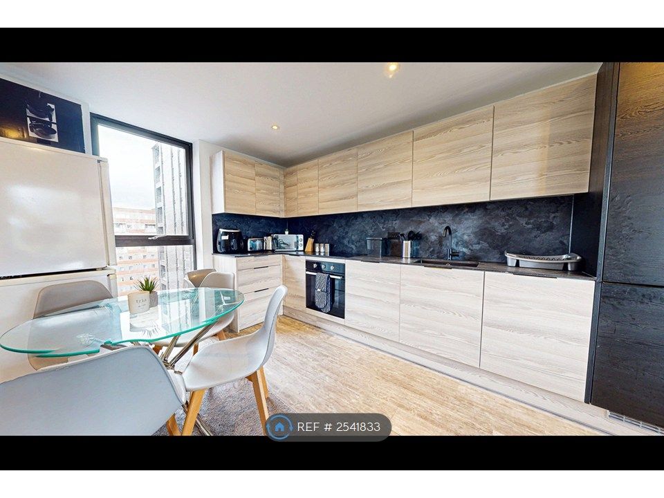 Property photo 3 of 8 Modern Kitchen With Dining Space