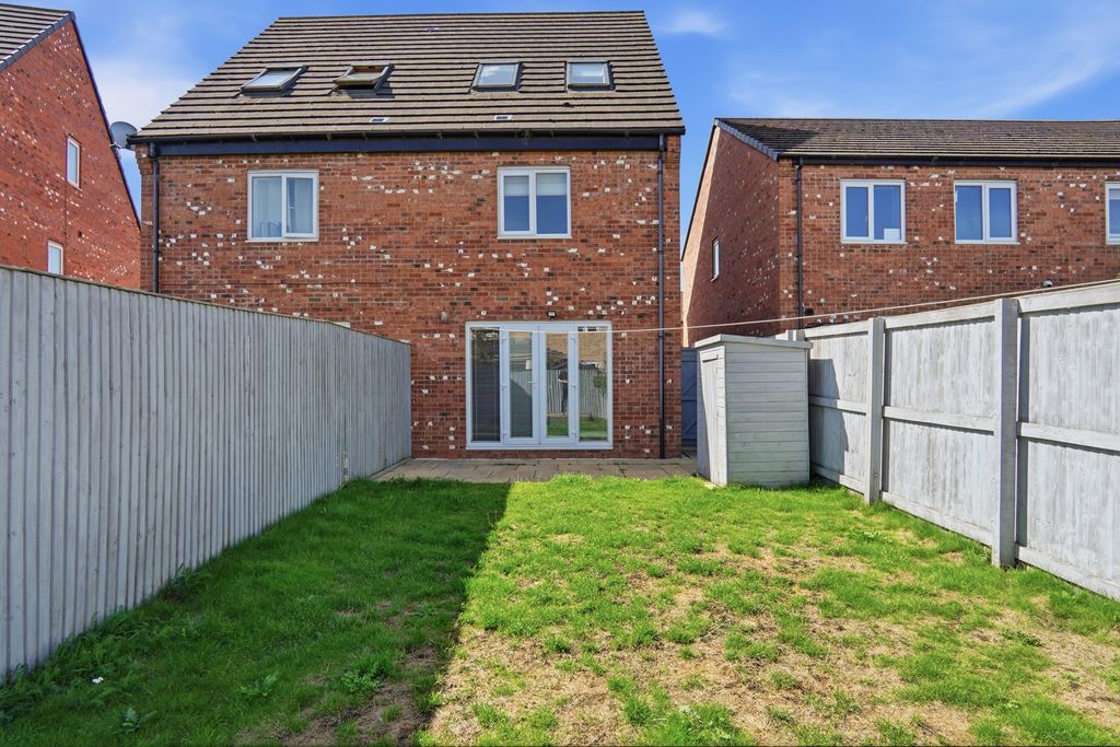 Property photo 3 of 18 Rear Elevation With Lawn
