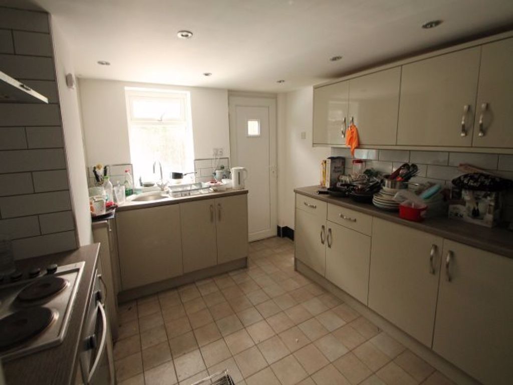 Property photo 3 of 5 Bright Kitchen With Ample Countertop Space And Mod...