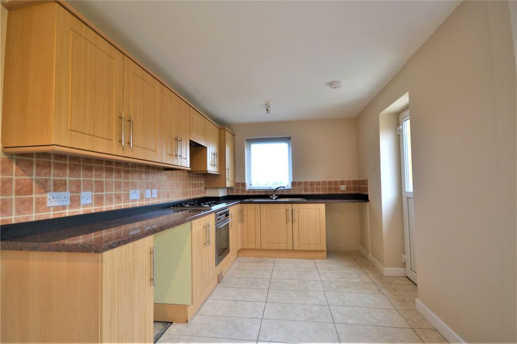 Property photo 3 of 12 Kitchen View 1