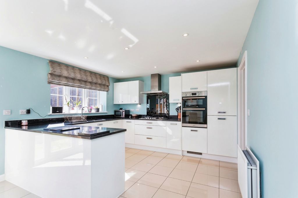 Property photo 3 of 17 Kitchen Three