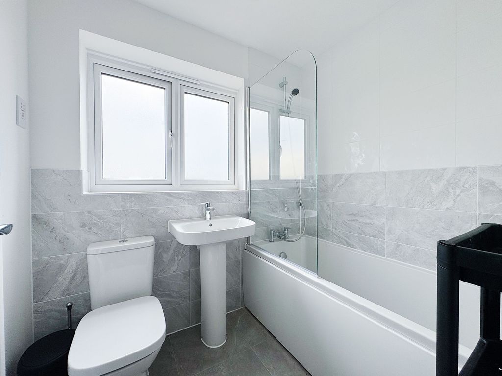 Property photo 3 of 28 Bright, Modern Bathroom With A Clean White Suite, ...