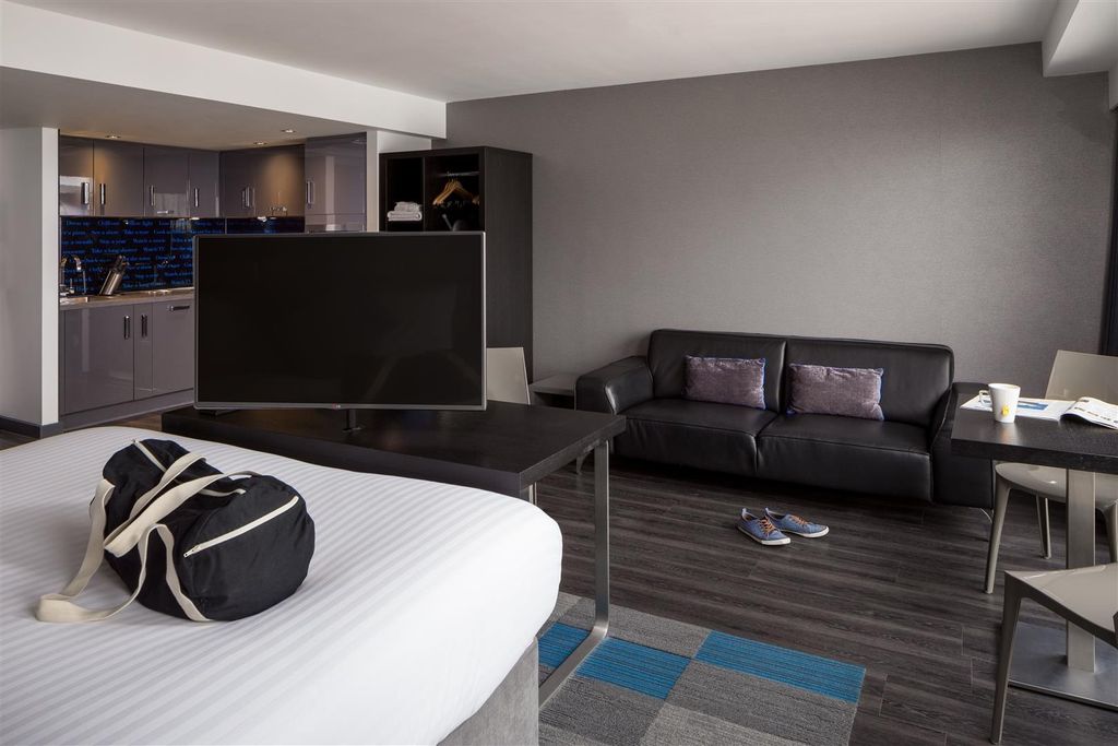 Property photo 3 of 7 Modern Studio With A Sleek Lounge And Kitchenette...