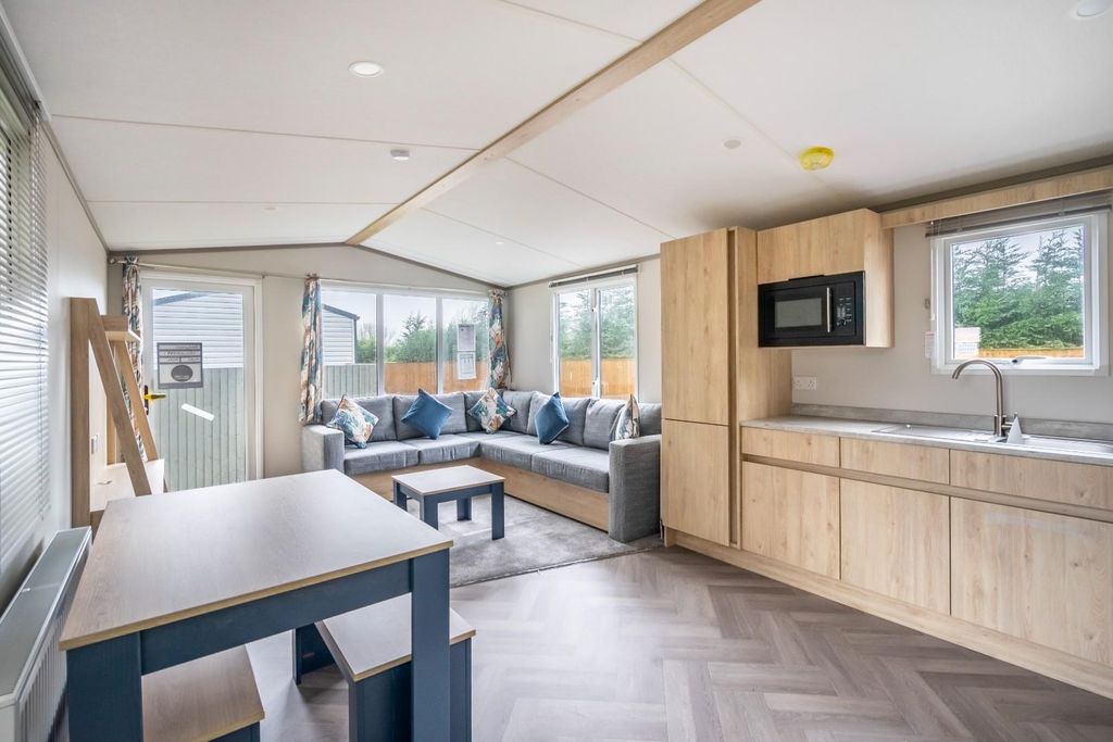 Property photo 2 of 13 Living Area