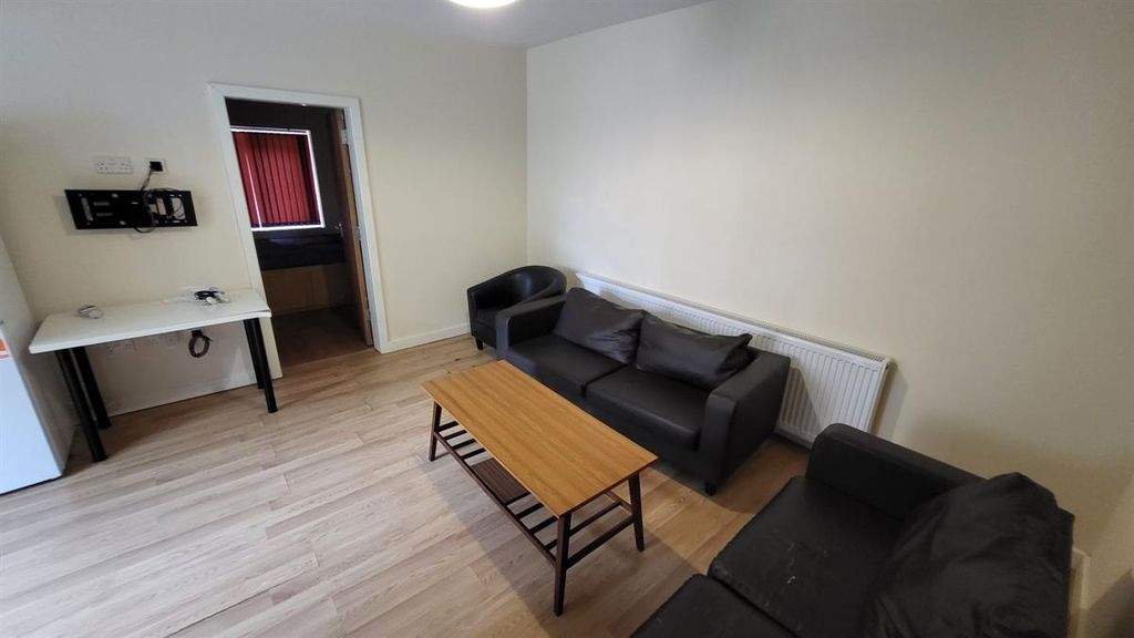 Property photo 3 of 14 A Spacious And Well-Lit Contemporary Living Room F...