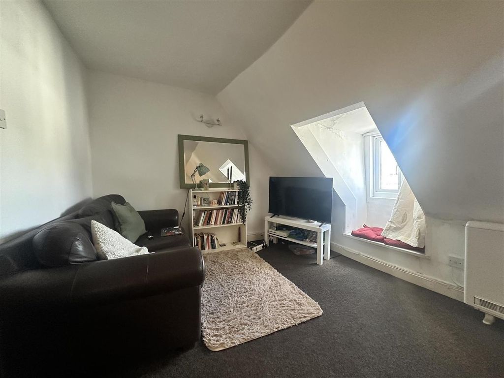 Property photo 2 of 6 Charming Living Space With A Bright Window Seat...
