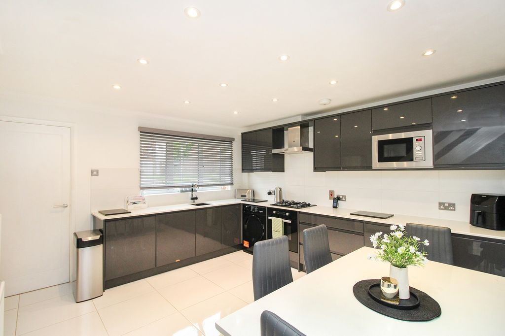 Property photo 3 of 12 Kitchen-Dining Room