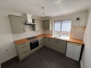 Property photo 2 of 8 Kitchen