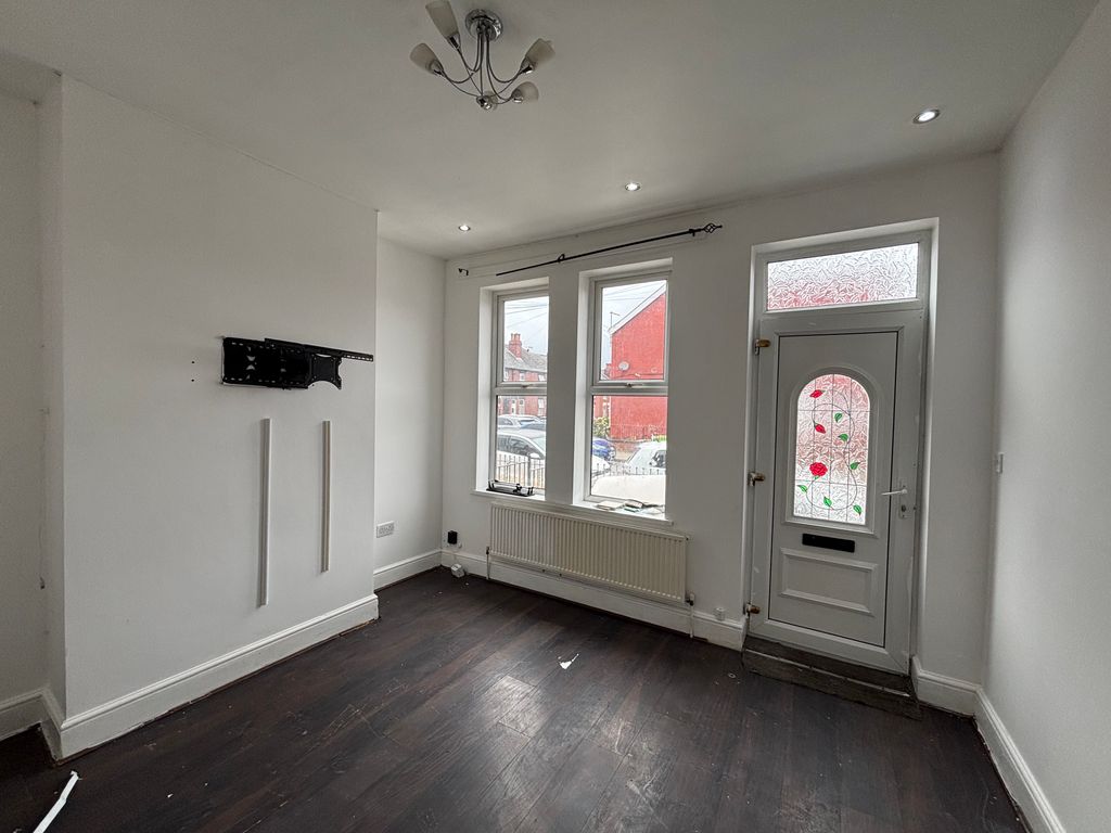 Property photo 1 of 9 Front Lounge 