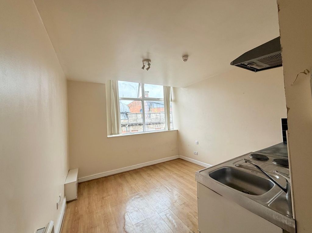 Property photo 2 of 14 Bright Kitchen Area Featuring A Large Window That ...