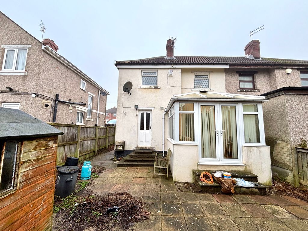 Property photo 2 of 11 Rear Of House