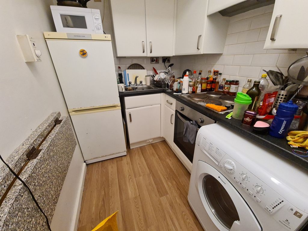 Property photo 3 of 5 Compact Fitted Kitchen With White Cabinetry, Frees...