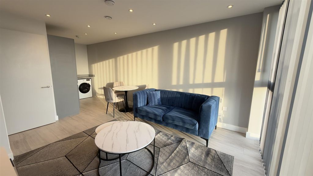 Property photo 1 of 12 Lounge 03.Png