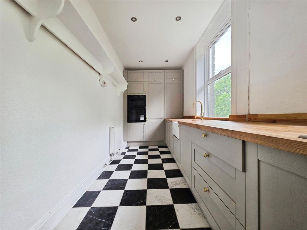 Property photo 3 of 13 Kitchen
