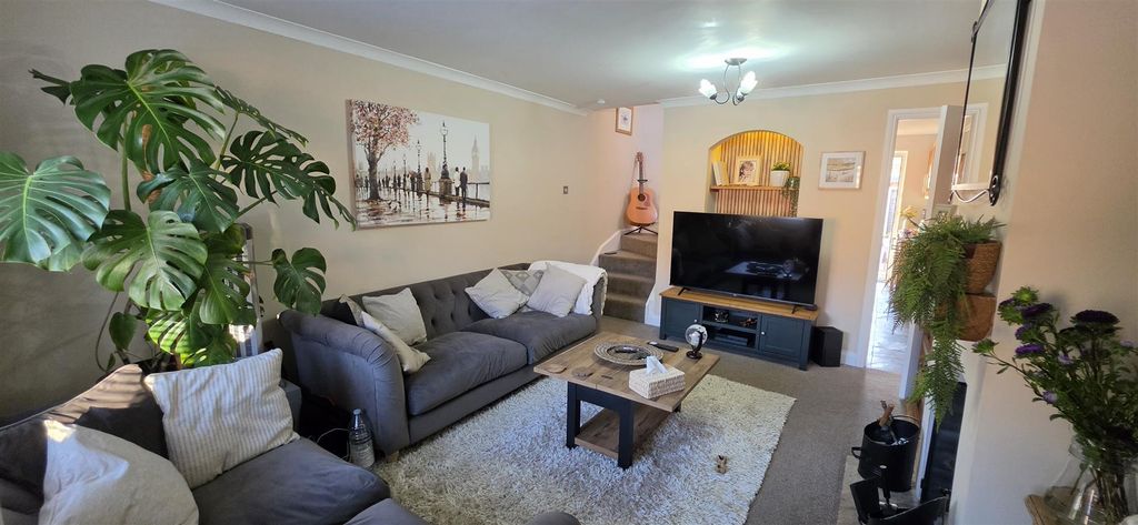 Property photo 2 of 13 Sitting Room With Carpet Flooring