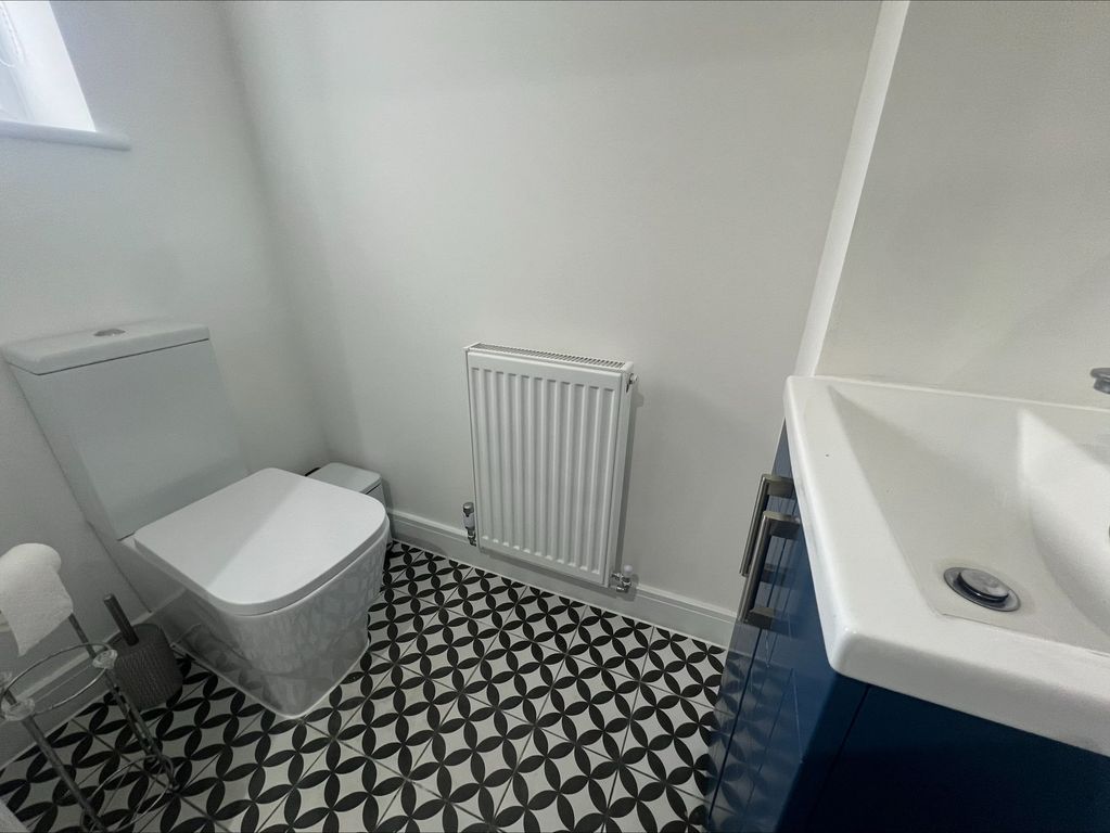 Property photo 1 of 13 A Modern And Tidy Single Toilet Room Featuring Cle...