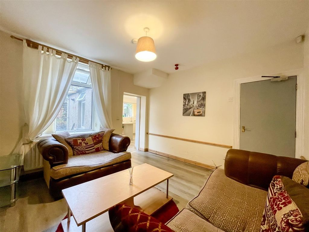 Property photo 3 of 4 Bright Living Area With Comfortable Seating...