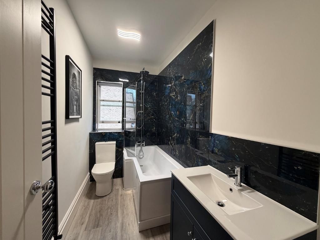 Property photo 2 of 8 Bathroom