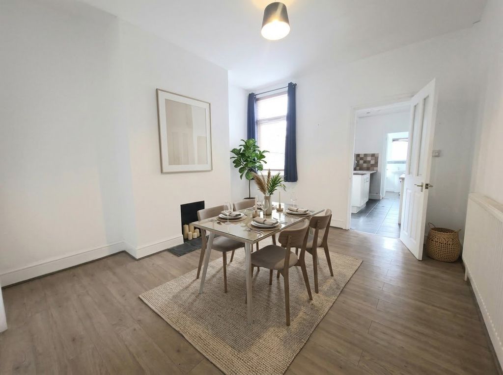 Property photo 3 of 16 Staged Dining Room