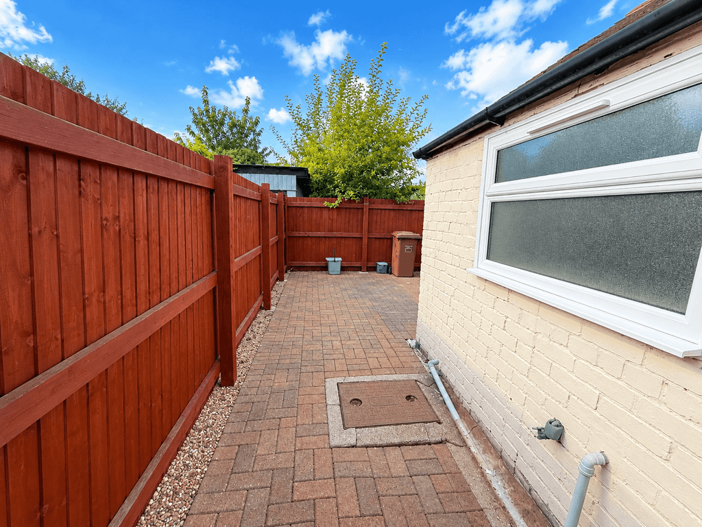 Property photo 3 of 12 Back Patio Path