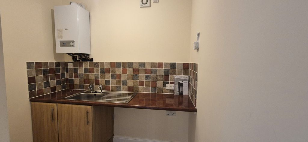 Property photo 3 of 8 Utility Room