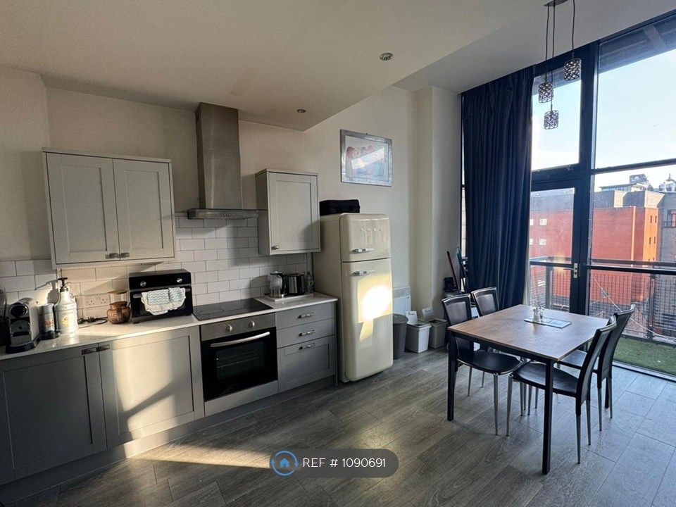 Property photo 3 of 12 Kitchen Living