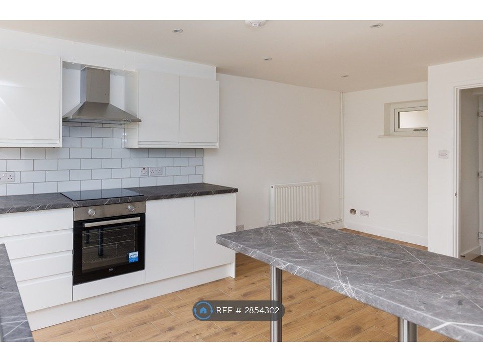 Property photo 2 of 12 Modern White Kitchen