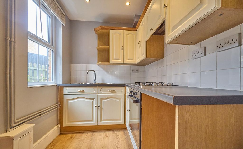 Property photo 3 of 10 Rear Kitchen