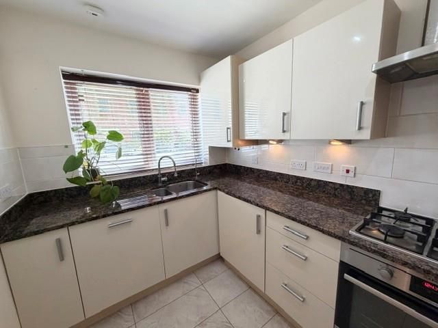 Property photo 2 of 12 Kitchen