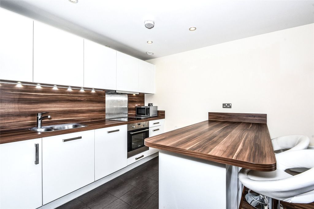 Property photo 3 of 8 Kitchen