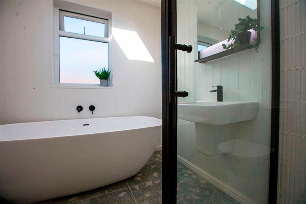 Property photo 3 of 10 Modern Bathroom With Freestanding Bath And Sleek W...