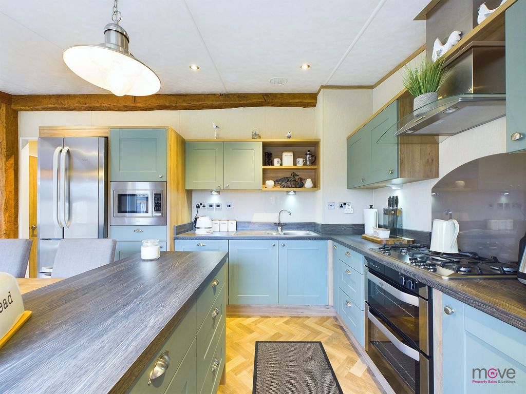 Property photo 2 of 12 Kitchen