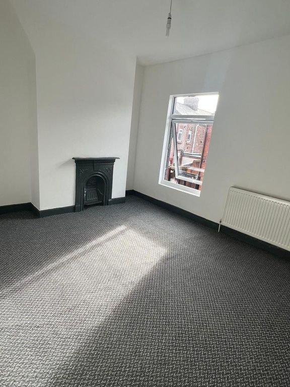 Property photo 2 of 12 Bright And Airy Living Room With A Large Window Le...