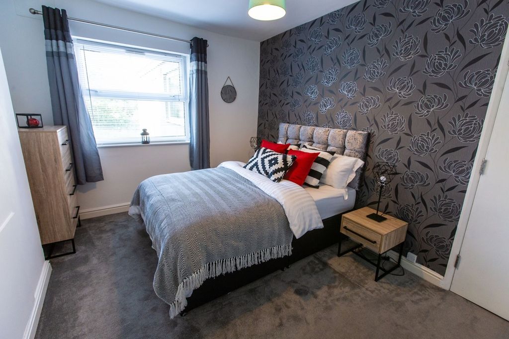 Property photo 2 of 13 A Clean And Inviting Double Bedroom Featuring Styl...