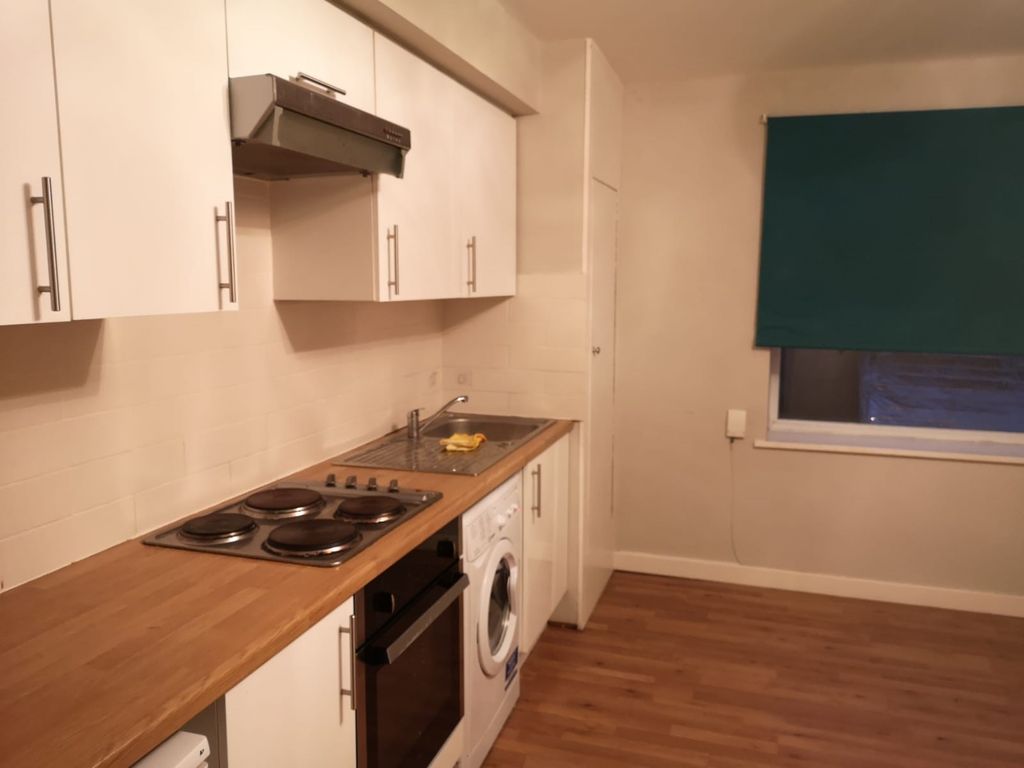 Property photo 1 of 4 Kitchen Area