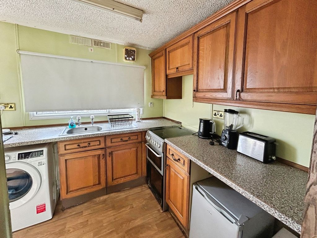 Property photo 3 of 13 Kitchen