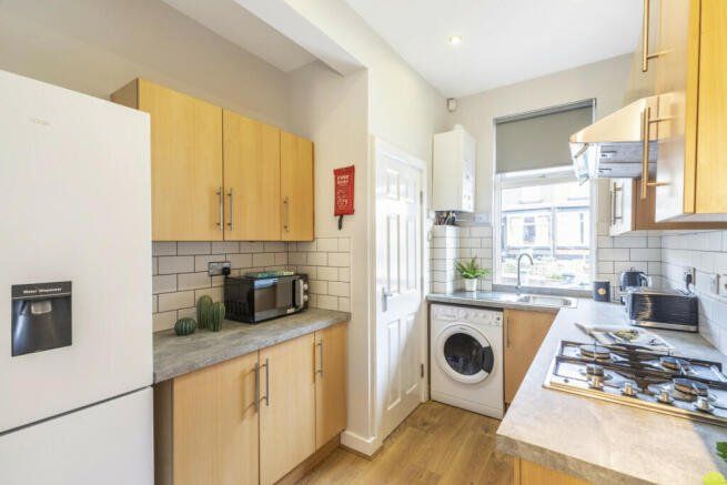 Property photo 3 of 12 Kitchen