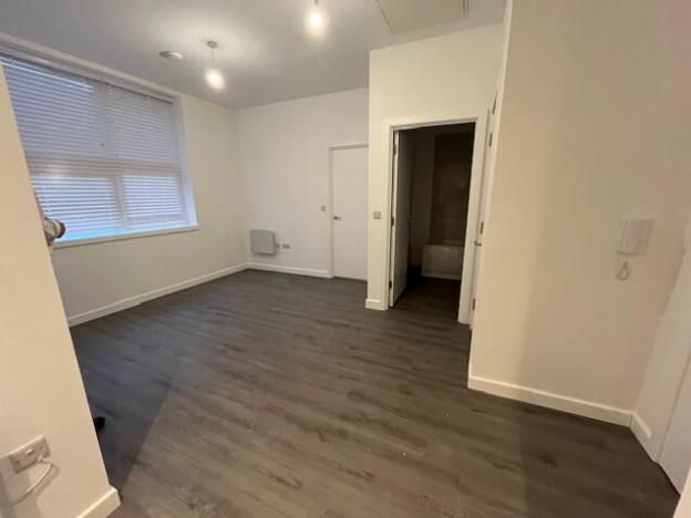 Property photo 3 of 12 Living Room